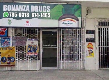 Bonanza Drugs storefront with CDAP signs and Jamieson vitamins advertisement on the exterior.