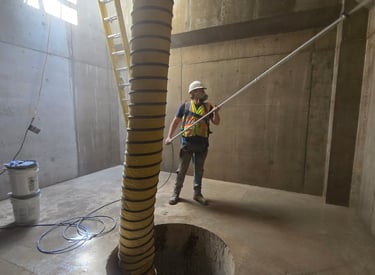 P3 Industrial being applied with sprayer in a industrial feed mill