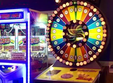 arcade game with wheel and bright lights