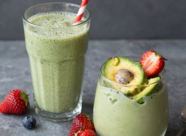 A happy person preparing a healthy meal in a bright kitchen, symbolizing transformation and wellness.
