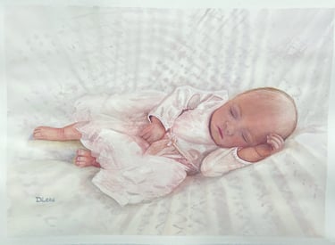 Watercolour of a baby sleeping on a blanket