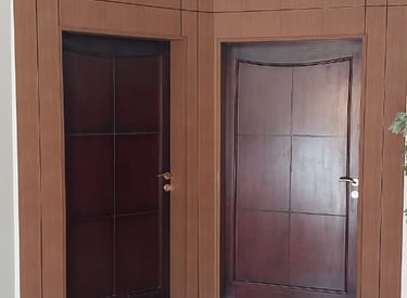 a room with a door and a door with a door handle
