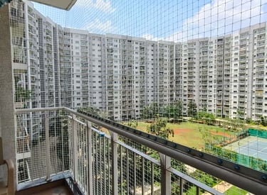 Close-up of a sturdy pigeon net installed on a residential balcony in Chennai.