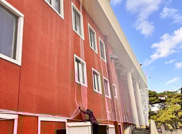 Wide shot of a balcony fitted with child-safe netting by Arjillo Enterprises.