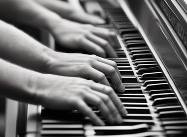 black and white close up of piano keyboard with hands