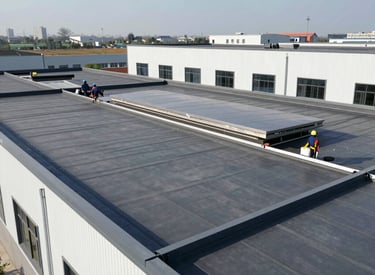 A professional roofer carefully inspecting a residential roof under clear skies.