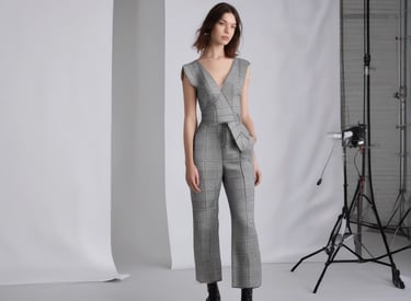 Creative photoshoot capturing an influencer showcasing a new product with natural light.