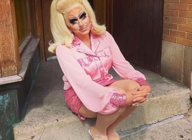 Trixie Mattel posing outside of This Is It! in Milkwaukee (photo via TITs Facebook page)