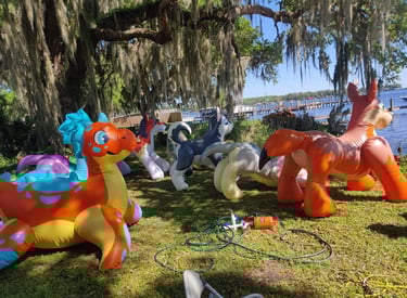 A bunch of Puffy Paws squeaks outside by water