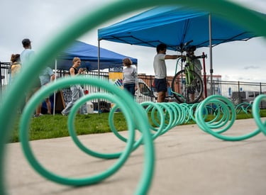 Close-up of the hose with the event in the background