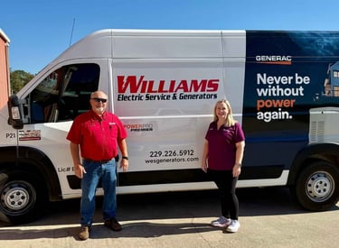 Father Bret and Daughter Whitney standing in front of there Williams service van