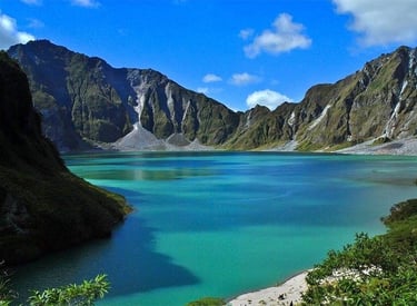 a lake with a mountain in the background