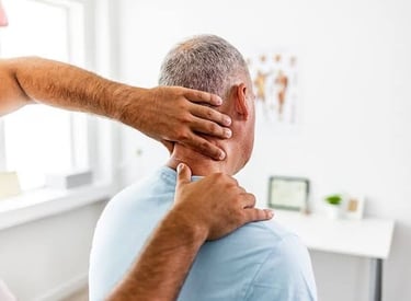 Home physiotherapy session treating a patient with cervical stiffness and posture imbalance