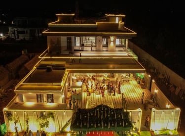 a large house with a red carpet and a red carpet