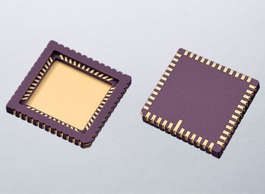 a couple of microchips sitting on top of a table