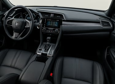 Interior do Honda Civic G10 Touring com destaque para painel, bancos de couro e acabamento premium.