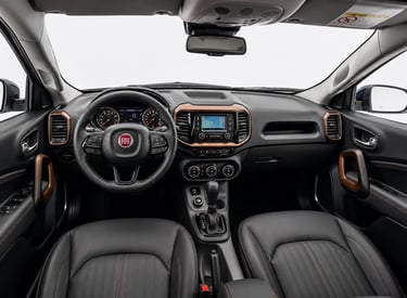 Interior da Fiat Toro Volcano 2016 com painel, volante multifuncional e central multimídia