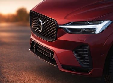 Volvo XC60 2026 híbrido em detalhe frontal com farol LED e grade premium