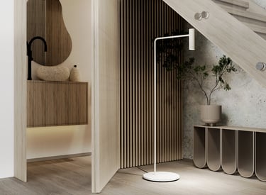 Modern minimalist interior design featuring a sleek wooden staircase with a built-in under-stair storage unit. The area inclu