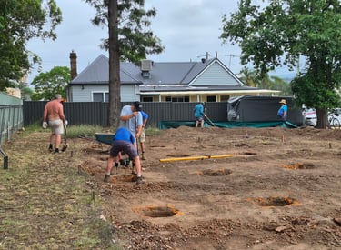 Digging holes for the temporary church site