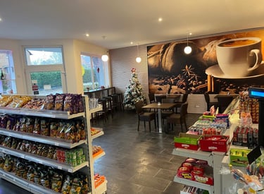 a coffee shop with a coffee shopperfection