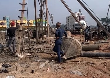 a group of men working on a construction site