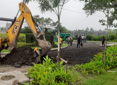 a JCB is being worked on by a man
