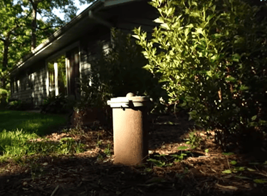 well pump head near residential home