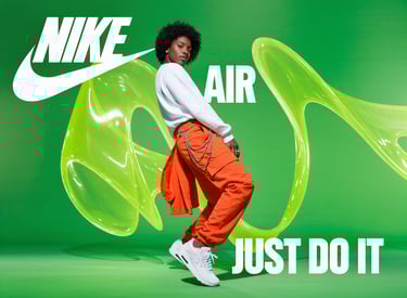 a woman in a white shirt and orange pants with a green background