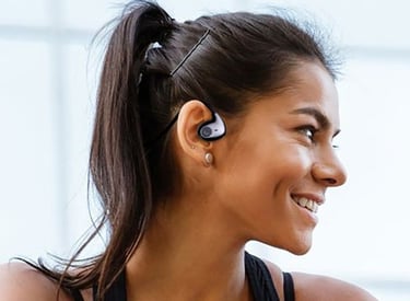 a woman with a sports earphones