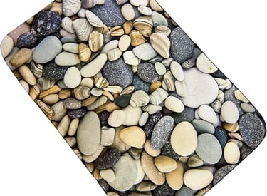 a bath rug with a bunch of different colored stones