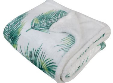 a white blanket with a green palm tree print
