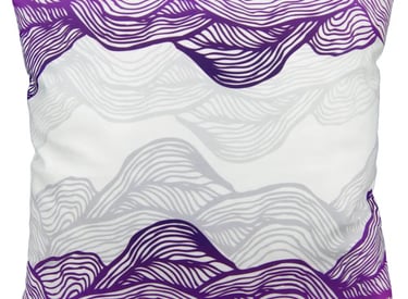 a pillow with a purple and white wave pattern