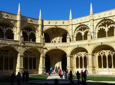 Lisbon - Inside courtyard at Jeronimos Monastery with fountains & intricate carved details