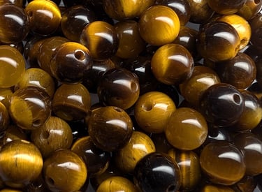 Perles en œil de tigre, aux reflets chatoyants dorés et bruns