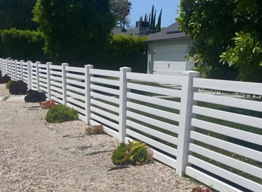 Custom horizontal vinyl fence.