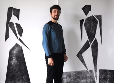Jacob Chandler with his prints of Phoebe and Sylvius from As You Like It