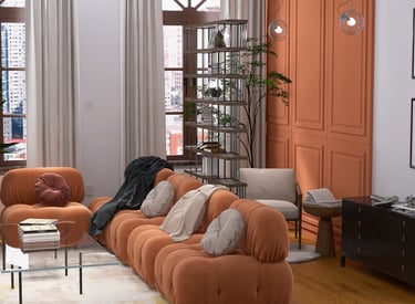 Nowoczesny loftowy salon z akcentami koloru pomarańczowego.