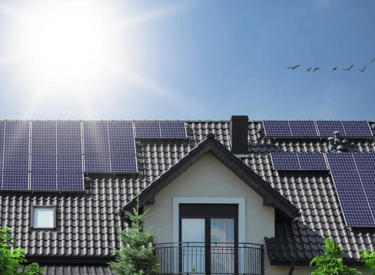 a house with solar panels installed on the roof