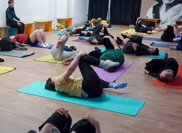 a group of people doing Awareness Through Movement