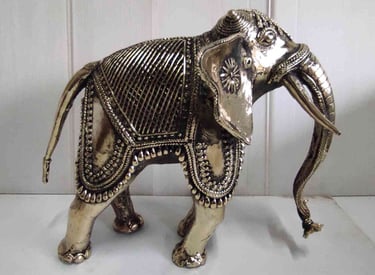 "Handcrafted brass elephant with artistic tribal design, right view-for overseas markets"