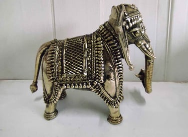 "Handcrafted angry baby elephant featuring floral tribal motifs-for foreign trade"