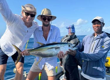 a man and a woman are holding a fish