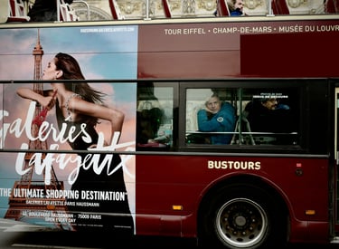 Bus traveling during its panoramic tour of Paris.
