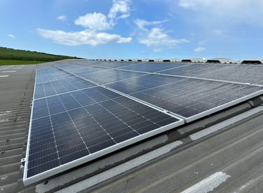 Solar array on top of a cement fibre agricultural building