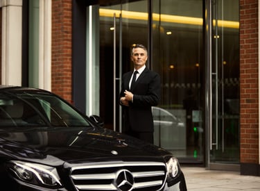 Driver Standing Next To Mercedes-Benz