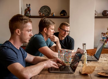 Team is working at the laptop