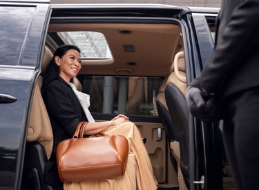 Woman is sitting in a VIP van