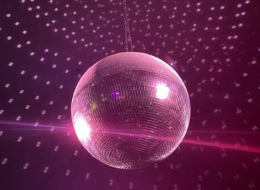 a disco ball hanging from a ceiling