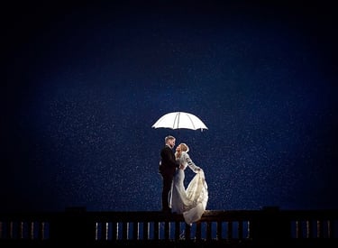 Wedding bride and groom in rain